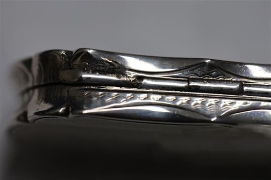 A Victorian silver shaped oval vinaigrette by Nathaniel Mills, the lid engraved with landscape scene,